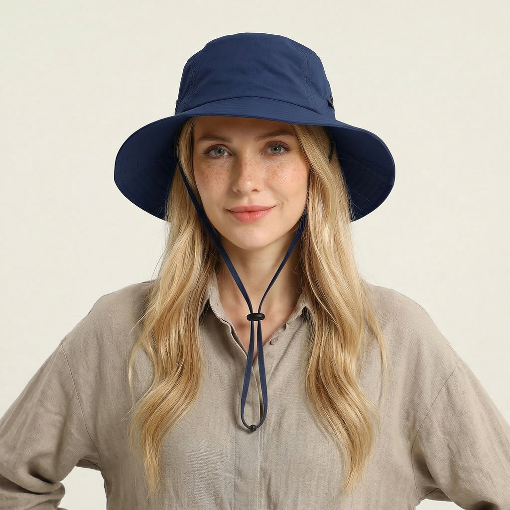 This versatile Meriple navy blue sun protection bucket hat is perfect for all your spring and summer outdoor activities. Featuring UV protection, an adjustable size for a customizable fit, and an XL option that is ideal for individuals with a larger head circumference. Whether you're hiking, fishing, or just enjoying a sunny day, this hat provides both comfort and sun safety.